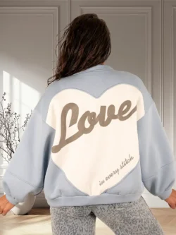 Lichtblauw sweatvest "Love" van Turquoise