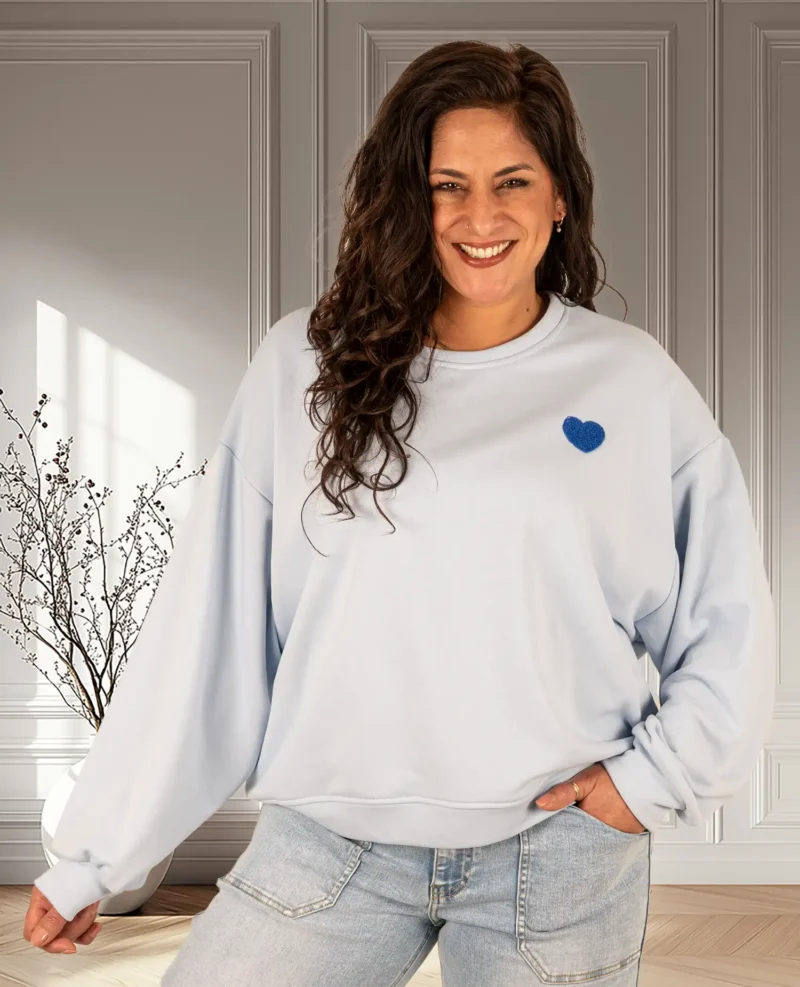Lichtblauwe sweater "Bisous" van Mooij