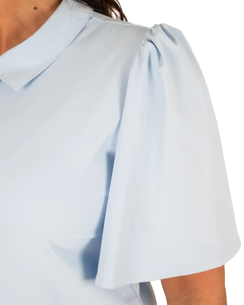 Lichtblauwe travelstof poloblouse van Triple Nine - Afbeelding 5